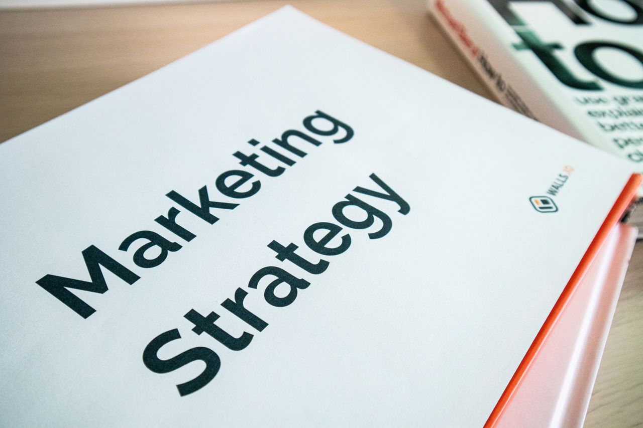 about-01 Close-up of a marketing strategy document on a desk, ideal for business content.